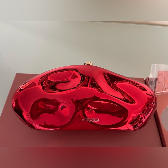 cult gaia Handbags - CULT GAIA THE CALDERA CLUTCH LOLLIPOP